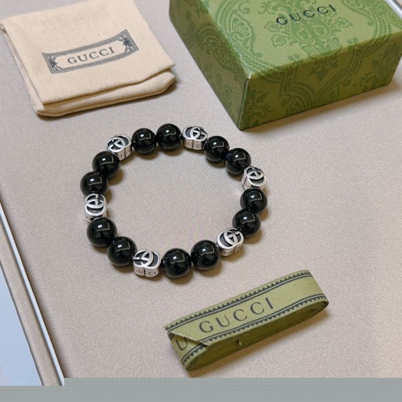 G*u*i bracelets